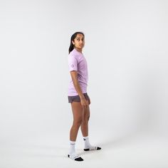 The Run Tee has been designed to disappear on the body during action motion. The Tellus fabric used throughout is durable yet lightweight. Tellus fabric is also extremely breathable, quick-drying and comfortably soft, which makes it ideal for run garments where motion stretch and minimal chaffing are essential. This item is good for weather 65° - 100° F. Stretch Moisture-wicking Short Sleeve Rash Guard, Moisture-wicking Stretch Rash Guard With Short Sleeves, Sporty Nylon Crew Neck Activewear, Athleisure Short Sleeve Tops In Recycled Polyester, Short Sleeve Athleisure Tops In Recycled Polyester, Short Sleeve Sportswear Top With Light Support, Compressive Sporty T-shirt For Running, Nylon Crew Neck Activewear For Workout, Light Support Short Sleeve Sportswear Top