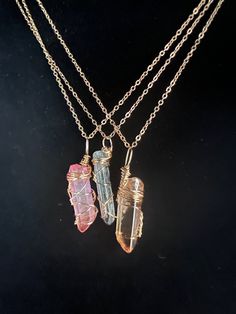 Angel Aura Quartz Necklace, Women's Raw Crystal Necklace, Cosplay, Men's Raw Crystal Necklace Choose from Blue, Gold or Pink Aura Crystals wrapped in gold or silver wire. Fill your life with passion, creativity and confidence with a beautiful Wire Wrapped Crystal Necklace. Each Raw Aura Crystal is a one of a kind because each crystal is a different size and shape and is wrapped in gold or silver wire. These Raw Crystal Wrapped Necklaces are beautifully handmade and you have a choice of leather, Gold Fantasy Jewelry With Wire Wrapping, Fantasy Style Gold Necklace For Cosplay, Fantasy Gold Necklace For Cosplay, Handmade Spiritual Blue Crystal Necklace, Spiritual Adjustable Hand-strung Crystal Necklaces, Wire Wrapped Crystal Necklace, Wrapped Crystal Necklace, Hand-wrapped Copper Wire Crystal Necklace For Gifts, Angel Aura Quartz Necklaces