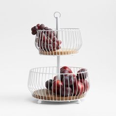 two tiered trays with fruit in them