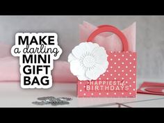 a bag that is sitting on top of a table with the words make a daring mini gift