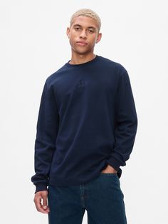 Soft, heavyweight cotton T-shirt.  Crewneck.  Long sleeves.  Gap arch logo at chest.  Fit: Classic.  A straight & easy fit.  Hits at the hip.  Models are 6′1″–6′2″ 185 cm–188 cm) with a 31″ 79 cm) waist & 32–33″ 81 cm–84 cm) inseam & are wearing Gap Arch Logo, Dark Night, Logo T Shirt, Tshirt Logo, Cotton T Shirt, Cotton Tshirt, Gap, Arch, Long Sleeves