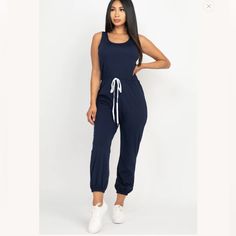 Soft Stretch Light Weight Double Knot Jersey Elasticized Waist With Ribbon Bow Model Is 5’8” Wearing A Size S Casual Fitted Jumpsuits And Rompers With Drawstring, Casual Blue Cotton Bodysuit, Casual Sleeveless Bodysuit, Blue Athleisure Jumpsuits And Rompers For Summer, Blue Sporty Bodysuit For Loungewear, Blue Stretch Casual Jumpsuits And Rompers, Sporty Blue Bodysuit For Loungewear, Casual Blue Stretch Jumpsuits And Rompers, Sporty Blue Jumpsuits And Rompers For Spring