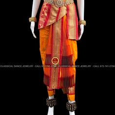 Design by Classical Dance Jewelry® -- Traditional Kuchipudi costume. -- material - art silk -- Type : Traditional pant costume -- size : see below measurements Medium Measurements: ( all the measurements approximately 1 margin buffer) PANT MEASUREMENTS: Pant Length: 33-34 inch Pant Waist: 30-31 inch Pant Hip: 33-34 BLOUSE MEASUREMENTS: Blouse length: 12 inch Blouse Shoulder length: 10 inch Blouse around Bust: 29-30 (extra margin) inch Blouse Lower Chest: 26 inch Blouse Sleeves length: 6-7 inch B Traditional Patterned Saree Dance Sets, Traditional Patterned Saree Sets For Dance, Anarkali Churidar For Ceremonial Festivals, Fitted Paithani Silk Sets In Traditional Drape, Ceremonial Handloom Sets With Traditional Drape, Traditional Drape Handloom Choli For Festivals, Handloom Choli With Traditional Drape For Festivals, Festival Handloom Choli With Traditional Drape, Fitted Bollywood Style Paithani Silk Set