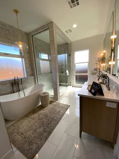 a bath room with a tub a sink and a mirror