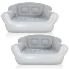 two white couches sitting next to each other on top of a white flooring