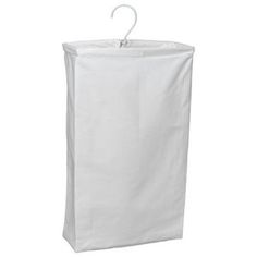 a white laundry bag hanging on a hook