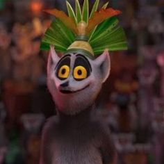 the animated character is wearing a green leaf headdress