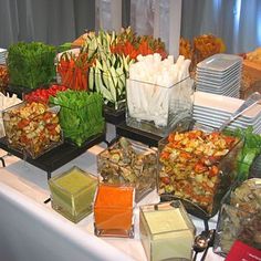 a buffet table filled with lots of different foods