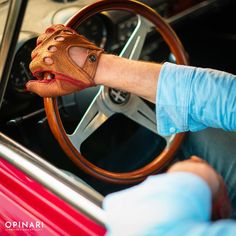 STRADA FACENDO BROWN/RED DRIVING GLOVES Strada Facendo means "En route." These driving gloves are made to fit classic as well as modern-day cars, with red details or exterior color. Both palm and top are cuoio brown, whereas the outside stitching is bright red. A sportive, yet classic combination. These men's driving gloves are handmade in Italy by artisans and are equipped with the gunmetal OPINARI press button. Needless to say, the driving gloves are delivered in our unique Essential case, rea Red Leather Boots, Red Details, Leather Care, Alfa Romeo, Exterior Colors