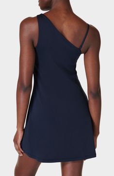 High-stretch fabric offers easy movement in this sporty dress with an asymmetric neckline, a removable strap and built-in shorts with drop-in side pockets. 31" length; 4" inseam; 18" leg opening (size Medium) One-shoulder neck Removable, adjustable strap Shelf bra Built-in shorts underneath with drop-in pockets Moisture-wicking fabric engineered for dryness and comfort 79% polyester, 21% elastane Machine wash, dry flat Imported One-shoulder Elastane Summer Dress, One-shoulder Summer Dress, Sleeveless Elastane One-shoulder Dress For Night Out, Blue Stretch One Shoulder Dress For Summer, Blue Stretch One Shoulder Summer Dress, Blue Stretch One-shoulder Dress For Summer, Asymmetrical Stretch Elastane Mini Dress, Asymmetrical Neckline Stretch Mini Dress, Fitted Sleeveless Asymmetrical Elastane Dress