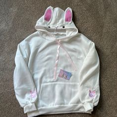 Adorable Kawaii Bunny Hoodie. Creamy White With Pink Accents And Soft Pink Ribbon. Purchased From Overseas But Was Too Small. It Has An Xl Tag But It’s More Of A Medium. R Tree His Is A Woman’s Size Shirt. Their Products Run Small. Not High End Quality So I’m Throwing In Some. Ute Kawaii Earrings, Too. Nwot. Never Worn. Rabbit Hoodie, Bunny Hoodie, Pink Sweat, Kawaii Earrings, Kawaii Bunny, Pretty Fashion, Pink Accents, Pretty Style, Colorful Hoodies