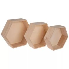 three wooden hexagonals sitting next to each other