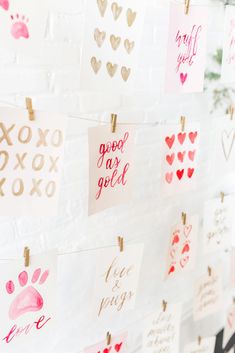 valentine's day cards hanging on a wall