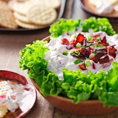 a salad and crackers on a table