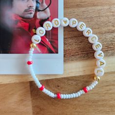 For the love of Charles! Do you love Charles Leclerc like I do? Our Lord Perceval. This friendship bracelet is for you. Lol. A subtle but fun nod to the fandom. (Polaroid not included.) This bracelet is hand made with acrylic and glass beads. They are handmade so each one is different based on the beads. The bracelet itself measures approximately 7 inches around. If you would like it sized differently, please let me know. Ferrari Friendship Bracelet, Inspirational White Handmade Friendship Bracelets, Inspirational Beaded Bracelets For Valentine's Day Friendship, Charles Leclerc Bracelet, F1 Bracelet Ideas, F1 Friendship Bracelet, F1 Bracelet, Car Shaped Cake, Bead Friendship Bracelet