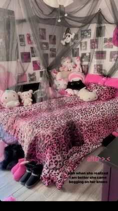 a pink and black bedroom with teddy bears on the bedspread, pillows and curtains