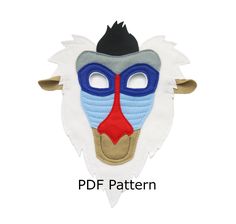 an animal mask with blue and red colors on it's face is shown in front of a white background