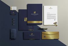 an assortment of stationery items including business cards, envelopes and letterheads