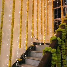 the stairs are decorated with garlands and lights