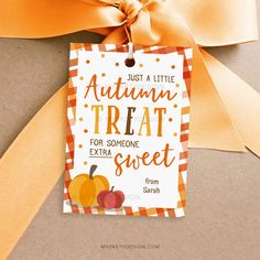 an autumn treat for someone extra sweet tag with orange ribbon and pumpkins on it