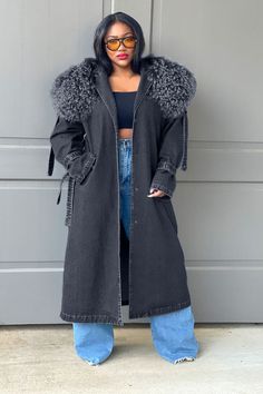 Description: Turn heads in this luxury Trench coat, crafted out of a mid weight denim fabric with an oversized fit. This coat features an exquisite exaggerated detachable mongolian fur collar. The trench is complete with a front button closure, detachable waist belt and side pockets, creating a sophisticated and stylish silhouette. The shoulder epaulettes can be fastened or unsnapped for added versatility. This outerwear is sure to keep looking chic and polished. PRE ORDER, ESTIMATED SHIP DATE 9 Oversized Spring Fur Coat With Faux Fur Trim, Oversized Faux Fur Trim Coat For Spring, Winter Denim Long Coat, Denim Outerwear With Faux Fur Trim, Spring Long Fur Coat With Pockets, Long Fur Coat With Pockets For Spring, Long Spring Fur Coat With Pockets, Fall Denim Outerwear With Faux Fur Trim, Denim Outerwear With Faux Fur Trim For Fall