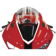 the front view of a red motorcycle with clear windshields and headlight covers on it