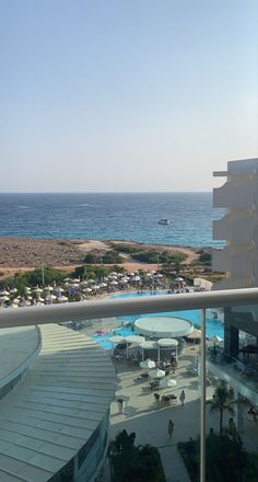 an ocean view from the balcony of a hotel room