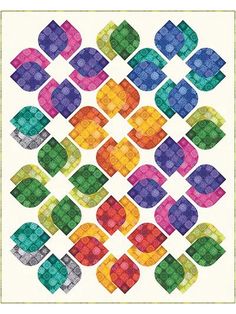 a colorful quilt pattern with circles and squares on the front, as well as an image of