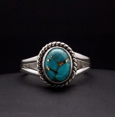 * Sterling Silver ring with Silver Included Turquoise. * The face of this ring measures about 13mm X 11mm * This ring is size 7 * You will receive the exact ring pictured. Classic Adjustable Turquoise Ring In Sterling Silver, Oval Turquoise Promise Ring, Adjustable Oval Turquoise Promise Ring, Nickel-free Turquoise Promise Ring, Classic Turquoise Ring As Gift, Nickel-free Round Turquoise Promise Ring, Nickel-free Open Turquoise Promise Ring, Nickel Free Round Turquoise Promise Ring, Adjustable Nickel-free Turquoise Ring For Anniversary