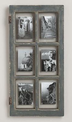 an old window with four pictures hanging on the outside and one in the inside frame