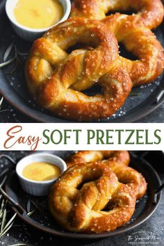 soft pretzels on a plate with dipping sauces and rosemary sprigs