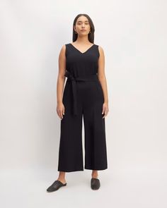 The Triacetate Belted Jumpsuit Black – Everlane Sleeveless Belted Jumpsuit For Work, Belted Sleeveless Jumpsuits And Rompers For Work, Fitted Sleeveless Jumpsuit With Belt Loops, Belted Jumpsuit, Belt Jumpsuit, Jumpsuit Black, Black Jumpsuit, Invisible Zipper, Deep V Neck