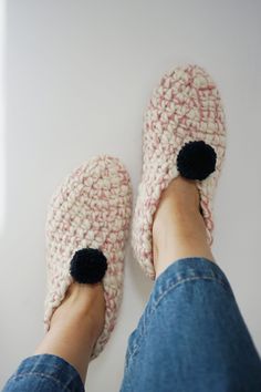 Ready to ship, these hand-crocheted wonders make for the perfect holiday gift.  Warm and snug, these cozy booties are guaranteed to give your feet the warm and fuzzies this Christmas. Give the gift of warmth and style to your loved ones, offering them a touch of handmade luxury that transcends the ordinary. Whether it's a treat for yourself or a thoughtful present for someone special, our women's bootie slippers are bound to bring joy and comfort to anyone lucky enough to slip their feet into them. Embrace the charm of handmade craftsmanship and the unparalleled comfort of 100% bulky wool with our women's bootie slipper. It's not just footwear; it's a wearable work of art ready to accompany you on your coziest adventures. - Crafted with care, those bootie slippers are labor of love, with o Hand Knitted Round Toe Slippers For Winter, Hand-knitted Round Toe Winter Slippers, Cozy Knitted Booties With Round Toe, Cozy Knitted Slippers With Round Toe, Hand Knitted Round Toe Winter Slippers, Cozy Hand-knitted Slippers With Round Toe, Cozy Hand-knitted Round Toe Slippers, Cozy Hand Knitted Slippers With Round Toe, Cozy Handmade Winter Slippers