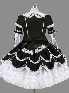 Black Bowknot Ruffles Gothic Lolita Long Sleeves Dress Black Gothic Dress With Doll Collar, Gothic Black Dress With Doll Collar, Fairy Kei Style Black Dress For Halloween, Black Fairy Kei Dress For Halloween, Fairy Kei Black Dress For Halloween, Fairy Kei Black Dress For Cosplay, Gothic Doll Collar Dress For Costumes, Gothic Ruffled Dress For Cosplay, Gothic Doll Collar Costume Dress