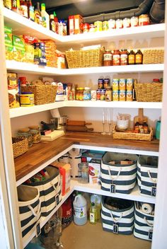 an organized pantry with baskets and food items