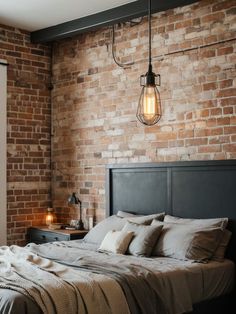 a bedroom with brick walls and a large bed