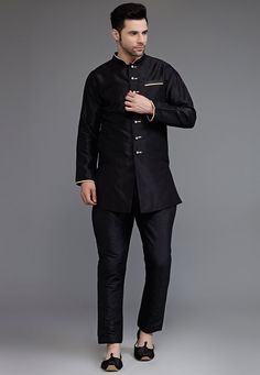 Art Dupion Silk Kurta in Black Color. This Ready-made Chinese Collar Neck and Full Sleeve attire is Enhanced with Buttons. Available with an Art Silk Pyjama in Black Color.   Do note: Footwear shown in the image is for presentation purposes only. Half to one inch may vary in measurement. (Slight variation in actual color vs. image is possible) We Sell all kinds of Menswear. Mens Kurta | Mens Kurta Pyjama | Traditional Menswear | Partywear | Menswear | Indian Mens Dresses | Diwali Kurta | Kurta P Elegant Black Set With Stand Collar, Fitted Black Bandhgala With Long Sleeves, Black Fitted Long Sleeve Bandhgala, Black Traditional Kurta With Stand Collar, Traditional Black Nehru Jacket With Stand Collar, Fitted Black Kurta With Stand Collar, Elegant Black Stand Collar Bandhgala, Elegant Black Bandhgala With Stand Collar, Fitted Black Bandhgala With Stand Collar