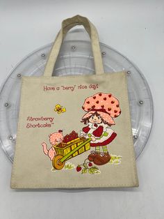 Vintage 1980’s Strawberry Shortcake Small Tote Bag. by Blastfrompasttoys on Etsy Retro Canvas School Bag, Vintage Rectangular Canvas Bag As Gift, Retro Rectangular Canvas Bag For School, Retro Rectangular Canvas School Bag, Vintage Cotton Shopping Bag, Cute Canvas Bag For Gifts, Vintage Canvas Gift Bag, Retro Tote Canvas Bag For School, Vintage Canvas Tote Bag For School