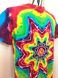 "Excellent vintage condition. No stains, no holes, no odors. Tag size M. Fits like a Men's Medium. Laying flat: 20\" Pit to Pit 27\" Top to Bottom Super colorful tie dye shirt with an awesome star shape on the front!" 90s Tie Dye, Alaska Wildlife, Metal Magazine, Animal Games, Tie Dye Shirt, Dye Shirt, Snoopy And Woodstock, Star Pattern, Guys Be Like