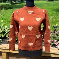 Brand New- Never Worn Super Cute Fall Sweater. The Shoulders Have A Tiny “Poof”. I Literally Just Got This From Shein And It Was Too Small. Needs A Good Home! The Color Is A Burnt Orange With Cream Colored Hearts. Fitted Heart Print Sweater For Fall, Orange Fitted Trendy Sweater, Trendy Fitted Orange Sweater, Fitted Trendy Orange Sweater, Cute Fall Sweater, Cute Sweaters For Fall, Shein Sweater, Fall Sweater, Orange Cream