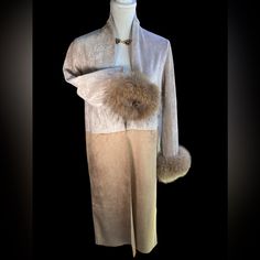 Beautiful And Luxurious Cream And Chamois Colored Soft Sueded Long Jacket With Fluffy Genuine Racoon Fur Cuffs. Brand New With Tag. Elegant Mink Long Sleeve Outerwear, Elegant Long Sleeve Mink Outerwear, Elegant Mink Outerwear For Fall, Beige Long Sleeve Outerwear For Evening, Luxury Cream Outerwear For Evening, Beige Long Sleeve Evening Outerwear, Elegant Fitted Taupe Outerwear, Chic Beige Outerwear For Evening, Elegant Brown Outerwear For Evening