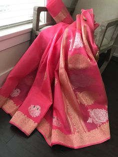 This is a beautiful handloom pure kora silk banarasi saree in a pleasant shade of bubblegum pink with kadwa sona rupa meenakari bird motifs in body, kadwa gold zari borders and sona rupa kadwa motifs in pallu. Saree comes with an unstitched blouse piece with motifs woven in kadwa technique. Falls, pico and tassels are done. Colour may vary slightly depending upon lighting. Handloom products may have some irregularities. All sales are final. Dry clean only. Traditional Drape Dupatta With Kora Details, Pink Handloom Tissue Silk Saree, Pink Tissue Silk Handloom Saree, Organza Saree With Zari Weaving For Puja, Bollywood Style Kora Dupatta, Organza Saree With Zari Weaving In Traditional Drape, Traditional Kora Tissue Silk Saree, Organza Dupatta With Pallu For Puja, Organza Saree For Puja