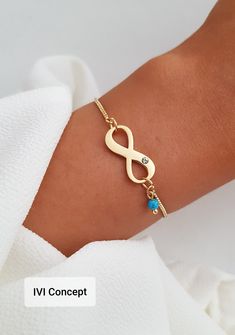 Infinity bracelet, Turquoise Friendship Bracelet, Infinity Charm Bracelet, Infinity Jewelry, Crystal Bracelet, Birthstone Bracelet, Infinity Love Bracelet, Bridesmaid Jewelry, Anniversary Gift, Anniversary Bracelet, Good Luck Bracelet, Infinity Bracelet for Best Friend, BFF Gift,  Bridesmaid Gift, Gift For Her This is a delicate natural Turquoise charm infinity bracelet with Zircon crystal and  18K gold plated adjustable chain. All of our jewelry is handmade and every stone is handpicked for the Dainty Infinity Jewelry For Friendship, Adjustable Infinity Friendship Jewelry, Adjustable Gold Infinity Bracelet, Adjustable Infinity Bracelets For Valentine's Day, Gold Infinity Bracelet Adjustable, Bracelet For Best Friend, Anniversary Bracelet, Infinity Charm Bracelet, Turquoise Charm