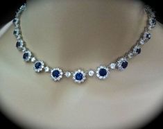 Pearl Necklace With Sapphire, Round Sapphire Necklace For Party, Luxury Sapphire Necklace For Wedding, Formal Blue Bridal Necklace With 17 Jewels, Elegant Sapphire Wedding Necklace, Classic Blue Wedding Necklaces, Sapphire Jeweled Necklace For Wedding, Sapphire Necklaces For Wedding, Sapphire Wedding Necklaces