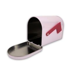 a pink and white mailbox with a metal tray on the bottom that has a red arrow sticking out of it