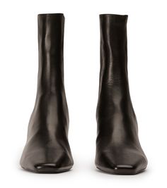 Verona, our sleek and sophisticated ankle boot, featuring elasticated side panels, a dainty squared toe shape and low heel. Don't miss out. -Material:Genuine Leather -Sole:Rubber -Fit:True to size -Toe-shape:Squared -Features:Elasticated Side Panels -Heel:5cm Modern Fitted Boots With Low Heel, Modern Fitted Low Heel Boots, Sleek Fitted Low Heel Boots, Fitted Leather Chelsea Boots With Square Toe, Chic Fitted Chelsea Boots With Square Toe, Fitted Square Toe Chelsea Boots For Work, Fitted Chelsea Boots With Stacked Heel For Fall, Classic Fitted Heeled Boots With Square Toe, Classic Fitted Square Toe Heeled Boots