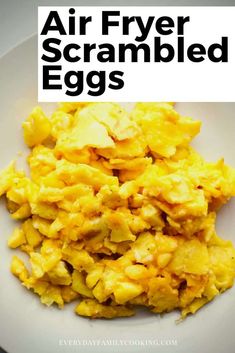 scrambled eggs on a white plate with the words air fryer scrambled eggs