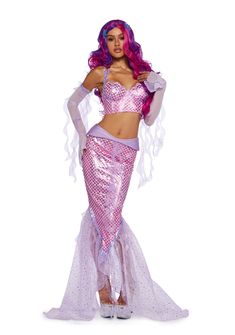 a woman in a pink and purple mermaid costume is posing for the camera with her hands on her hips