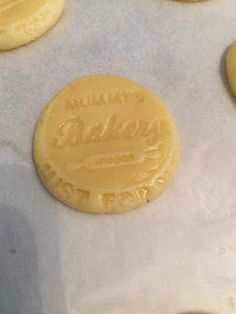 some cookies are sitting on top of wax paper and ready to go into the oven