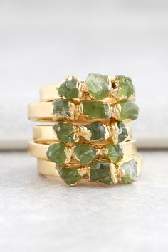 Stacks of green peridot rings for the perfect April birthday gift. Simple Statement Necklace, Raw Peridot, Raw Stone Ring, Green Stone Rings, Peridot Jewelry, Jewelry Dainty, Textured Ring, Vintage Style Jewellery